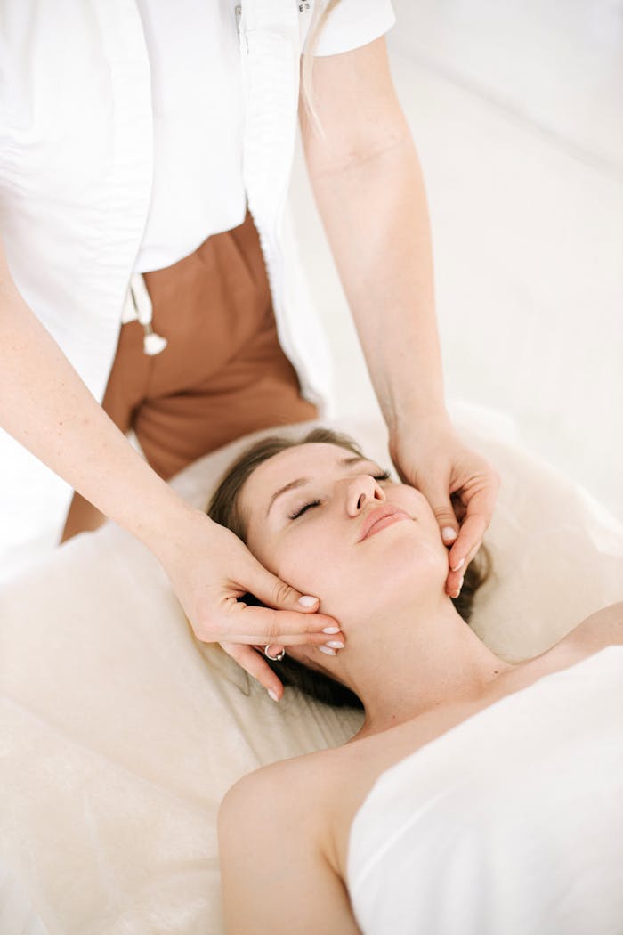 A soothing facial massage therapy session promoting relaxation and wellness.